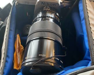Nikon FG $ 78.00 - with lens shown included / some accessories and case.