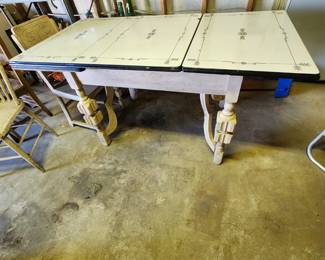 Antique dining room table with enamel top.