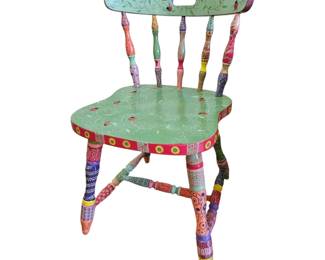 one of the three painted chairs]