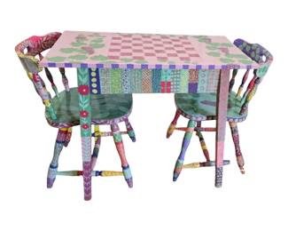 Delightful whimsical artfully painted small table and three chairs. Very well done.