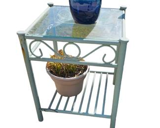 Outdoor table with glass top