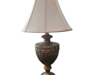 Gold color lamp with shade. One of a pair