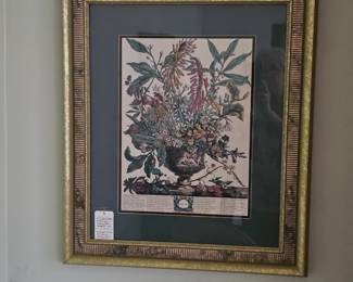 One of a pair of matted and nicely framed floral prints. One is January and the other is October