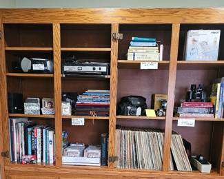 Misc items in office - books, cameras, Bibles, radios, CDs, Cassettes, 8 Tracks, Vinyls and more