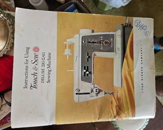 Very cool complete vintage zig zag sewing machine in cabinet 
$250, with extras 