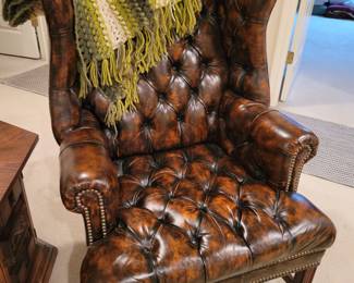 Tufted leather chair'