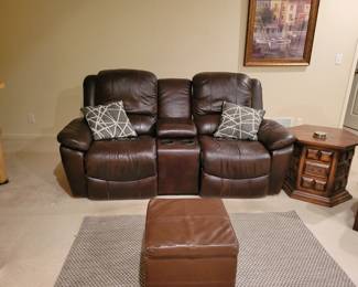 Dual reclining leather sofa