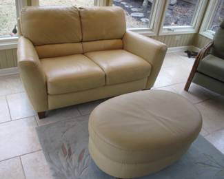 Cream leather loveseat & ottoman