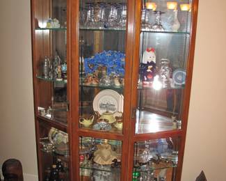 Curio loaded with choochkies 52" x 76"
