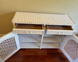 White Wicker Server cabinet/drawers
46.5”w 15.5”d 34.5”t.    $ 350.00
