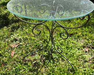 Small glass top table. 18”diameter 18.5”t
$ 45.00