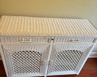 White Wicker Server cabinet/drawers
46.5”w 15.5”d 34.5”t.    $ 350.00
