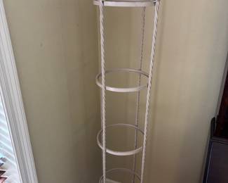 Metal Regency style Etegere
12.75” diameter 77”t.     $ 150.00