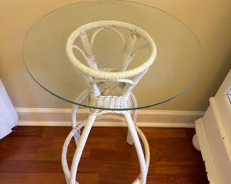 White Wicker Glass top Table 
18” diameter 31”t.                   $ 45.00