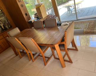 MCM oak dining room table & chairs available after close. A deposit holds it.