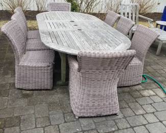 Teak dining table seats 8