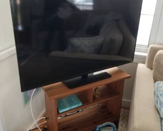 Flat screen TV; bookshelf stand