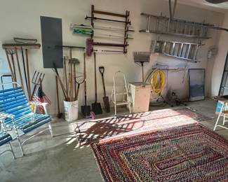 rakes, brooms, shovels, tools, ladders