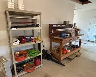Garage shelves (3), rolling workbench, extension cords, ShopVac, Blower, tools