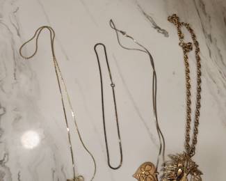 4 GOLD TONE NECKLACES