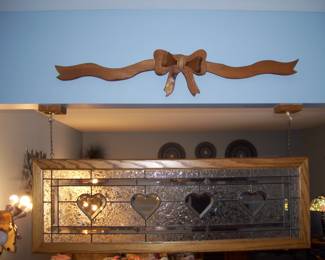 Stain glass hanging - wood carved bow