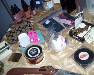 Hockey -baseball stuff - brass salmon doorbell - fitbit watchbands- coach clutch