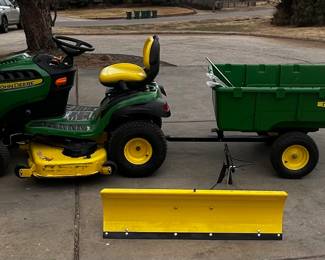 John Deere S240 with snow plow, utility cart, weights and chains (only 47hrs used)