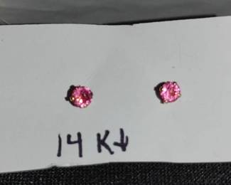 Tiny pink sapphire earrings in 14 karat gold