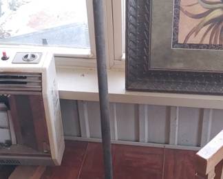Vintage standing metal fan with cast iron base