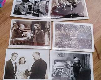 Large stack of black and white glossy photos used at theaters long time ago for advertising movies