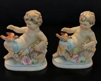 Beautiful vintage bisque figurines child with bird pair