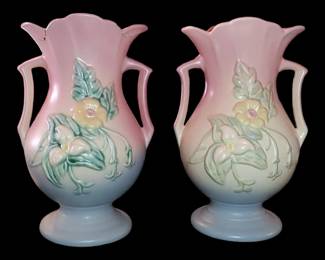 Beautiful pair of pastel colored vintage hole Magnolia vases ( one is perfect and one has repairs)