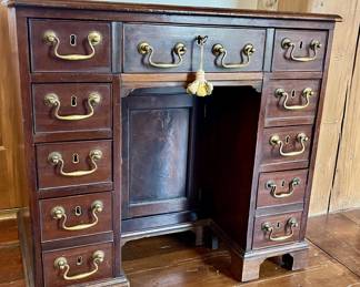 DIMINUTIVE CIRCA 1840’s KNEE HOLE DESK WITH ORIGINAL PULLS