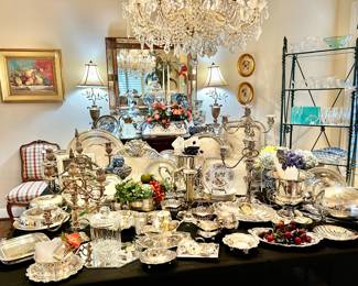 Dining room overflowing with crystal including Parker Ellis English silverplate.