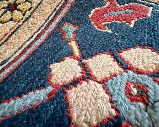 hand knotted wool rug.