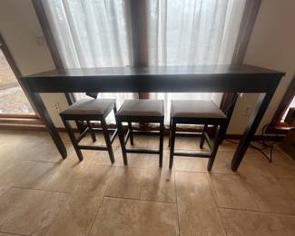 Sofa table with bar stools 