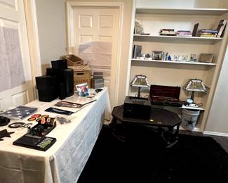 books, Dallas Cowboys paraphernalia, trumpet, dart scorer, metal puzzle-sold, records-sold, speakers, baskets