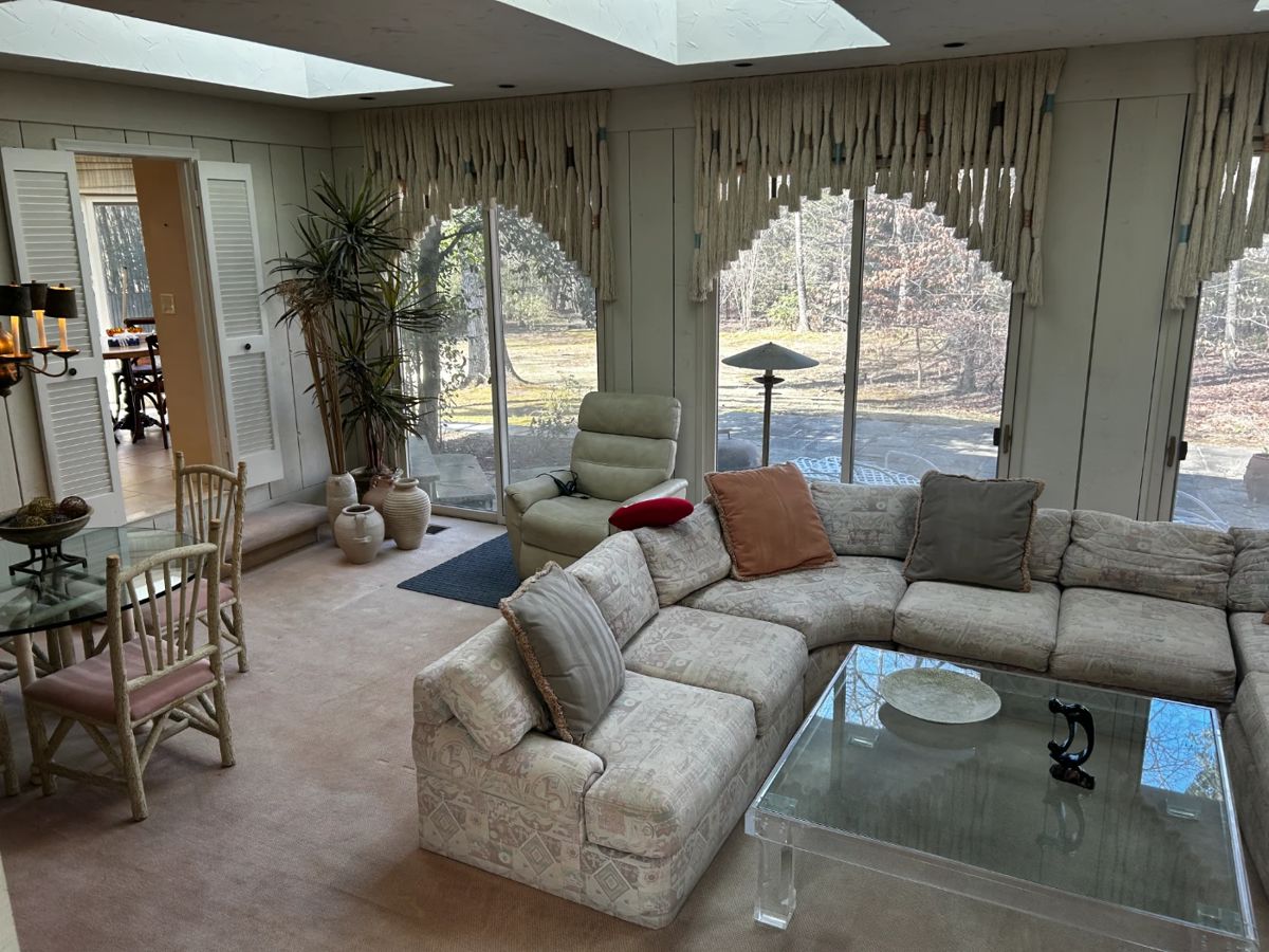 Sunken LR with cool, shaggy window treatments