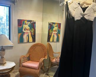 Large walk-in closet filled with women's wardrobe