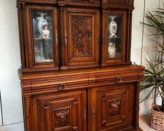Continental carved cabinet