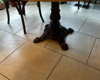 Butcher block round table with cast iron base