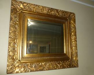 gold-framed mirror