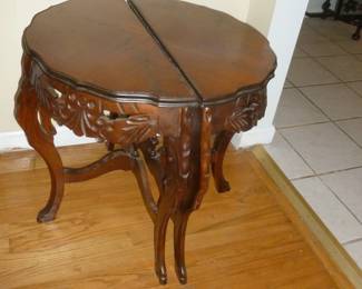 pair of carved 1/2 tables
