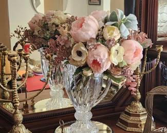 Crystal vase, floral boquet, worlds fair bubble necklace.