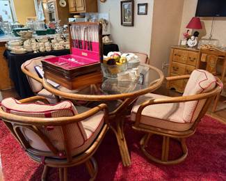Bamboo rd glass top table with 4 swivel chairs