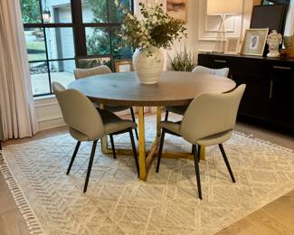 Four Hands round table, 4 grey leather chairs