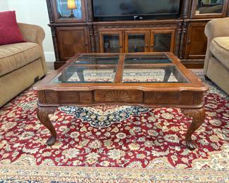 Coffee table with glass inserts