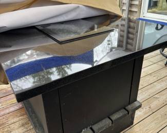 Outdoor fire pit with marble top, newer