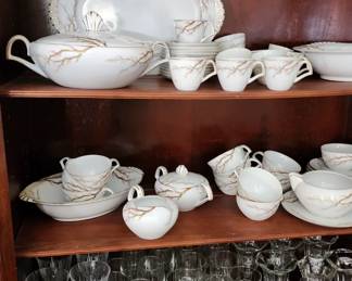 Kent china with beautiful glassware on bottom shelf