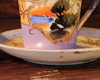 Set of Empress China demi tasse cups and saucers